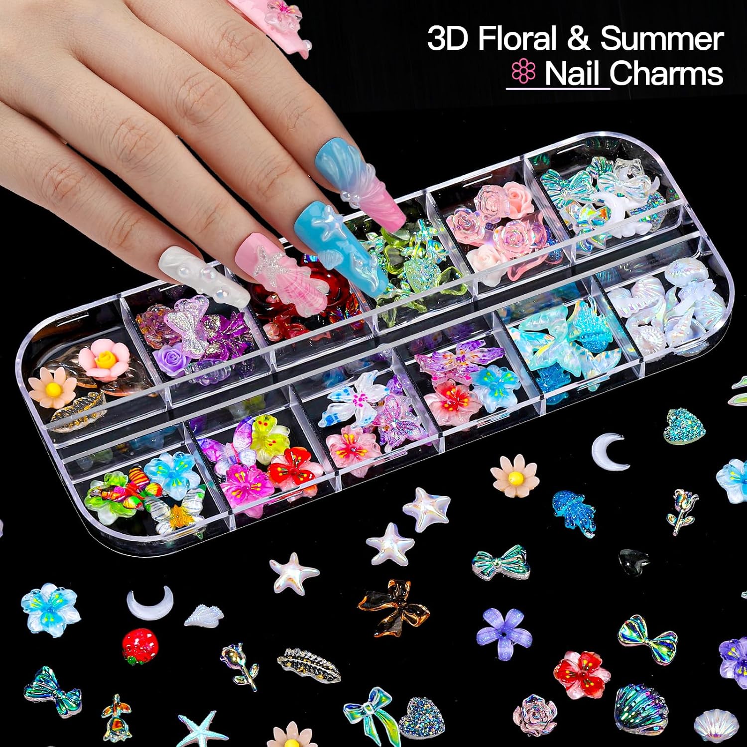 Fandamei nail art kit laid out with boxes of gems, pink magnetic nail holders, brushes, dotting pens, stickers and a tweezer - 3