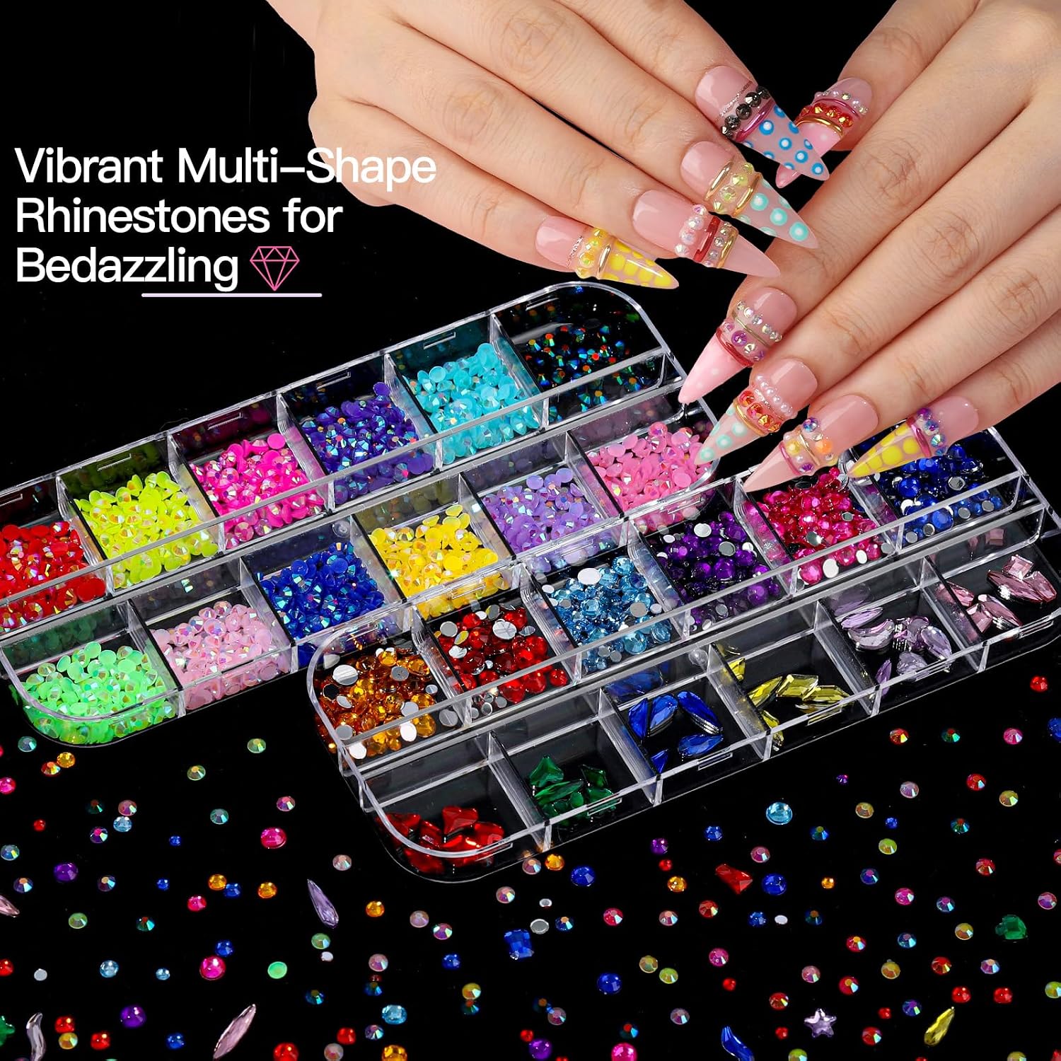 Fandamei nail art kit laid out with boxes of gems, pink magnetic nail holders, brushes, dotting pens, stickers and a tweezer - 4